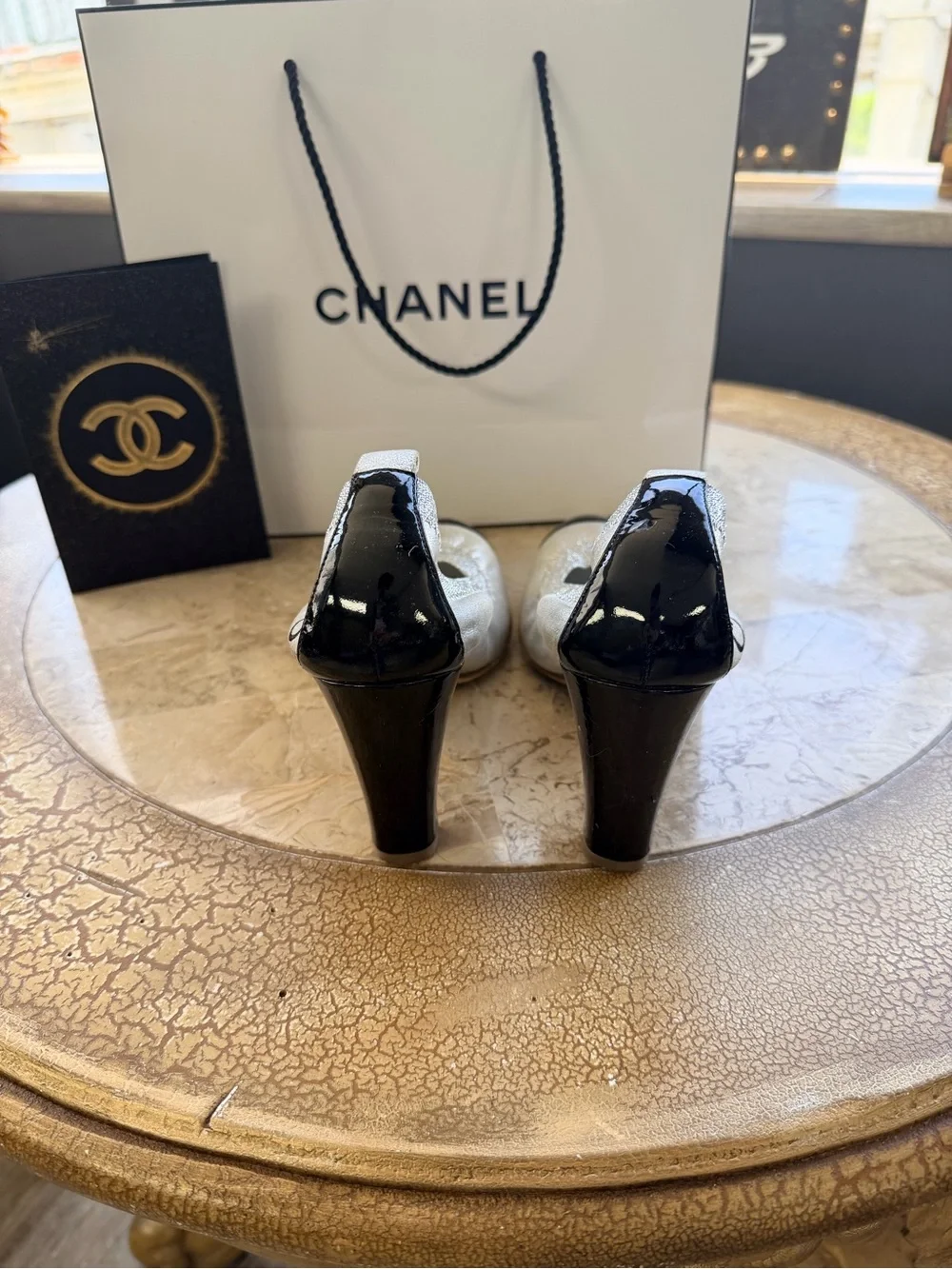 CHANEL Silver Leather Ballet Flats with Black Cap Toe